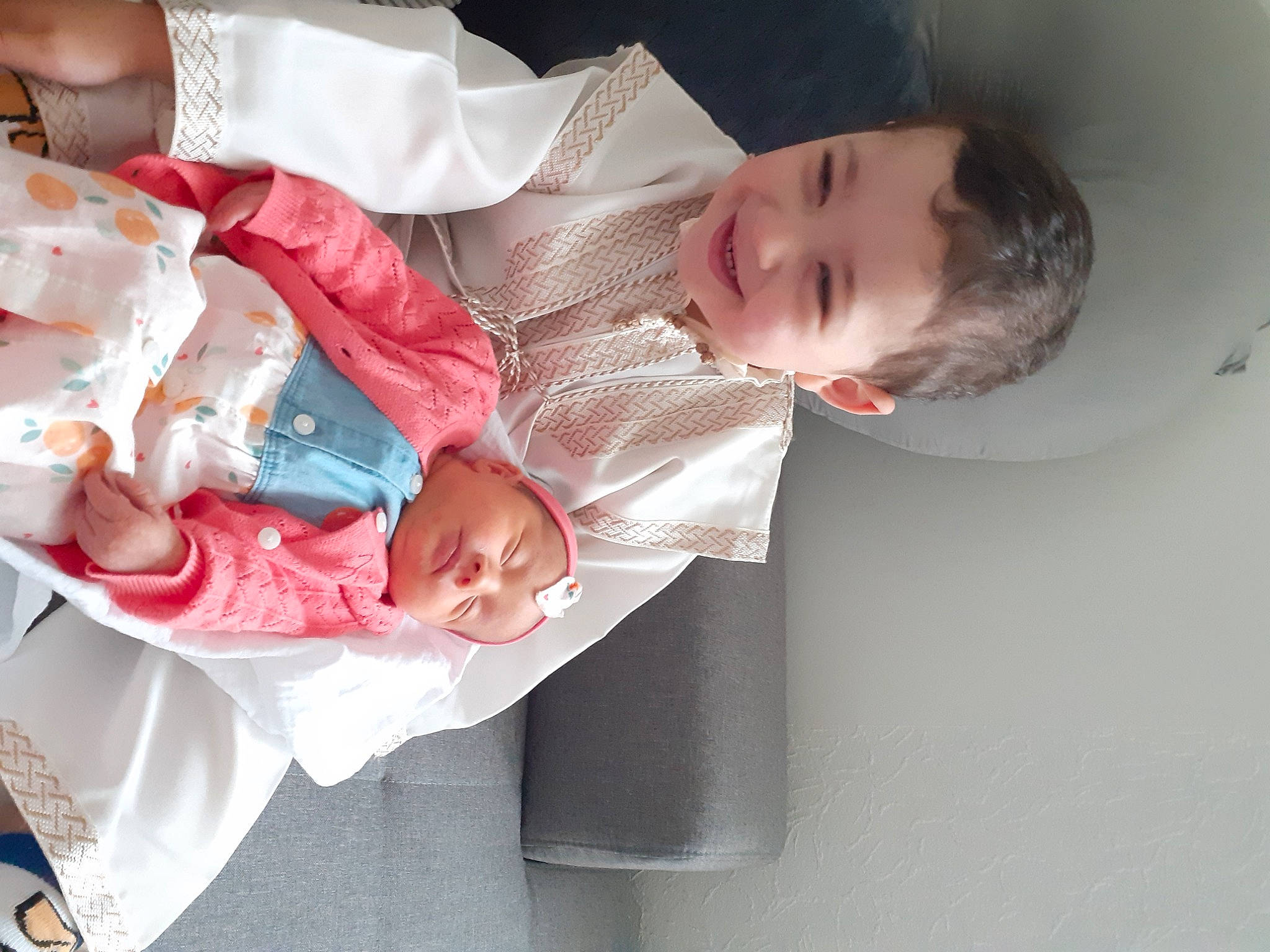 Ilyane participe au concours pour gagner de l'argent avec cette photo : baby, baby_products, baby_toddler_clothing, cheek, child, comfort, dress, event, eyelash, flesh, happy, hat, headwear, joy, mouth, pattern, person, sleeve, smile, textile