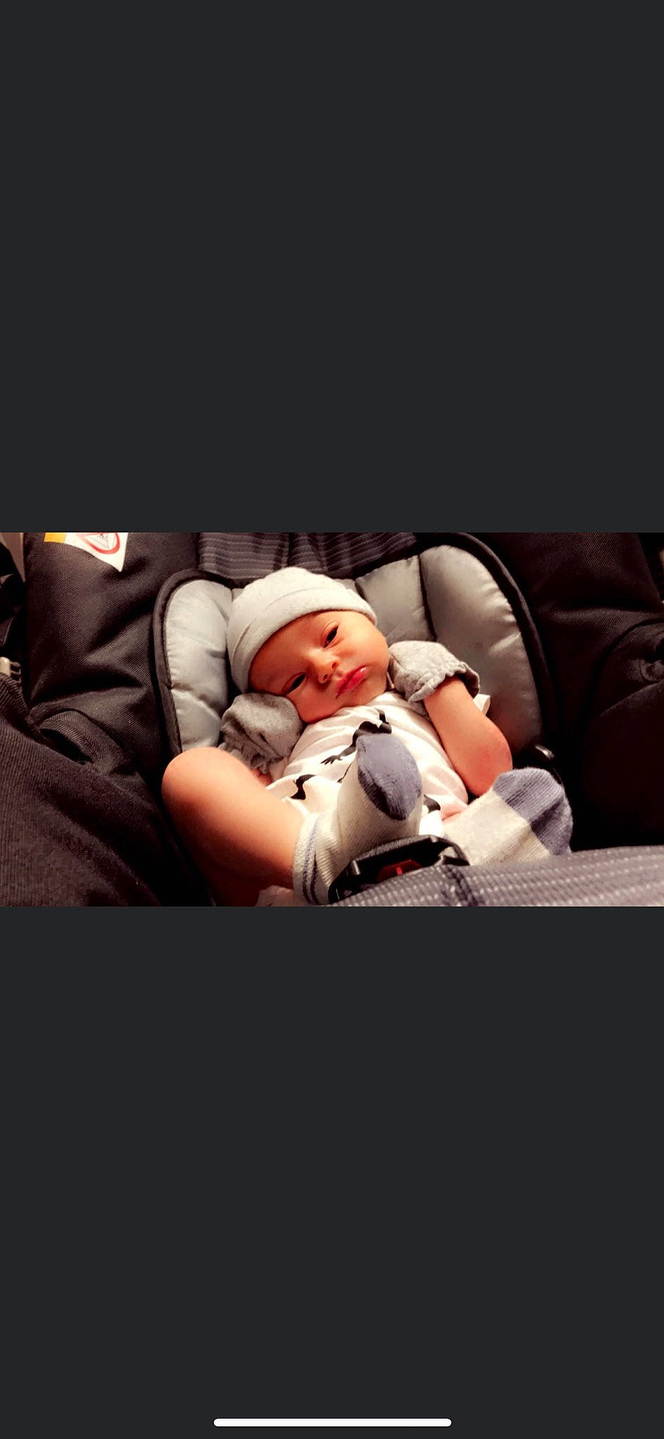 Christian is registered to the contest to win money with this photo: baby, baby_products, baby_safety, baby_sleeping, baby_toddler_clothing, bedtime, carmine, comfort, darkness, flash_photography, flesh, headwear, linens, nap, person, portrait_photography, room, sitting, sleep, sleeve