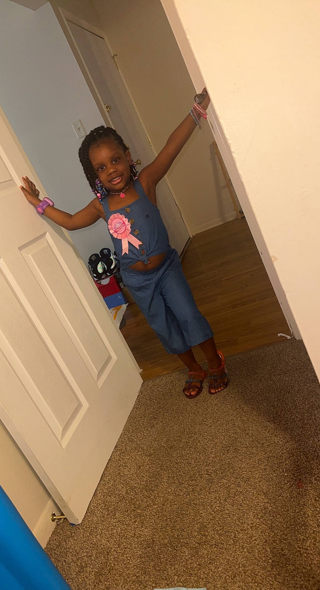 Azyiah is registered to the contest to win money with this photo: elbow, finger, floor, flooring, fun, hardwood, house, human_leg, joy, knee, leg, magenta, pattern, person, shorts, shoulder, sock, stairs, t_shirt, thigh