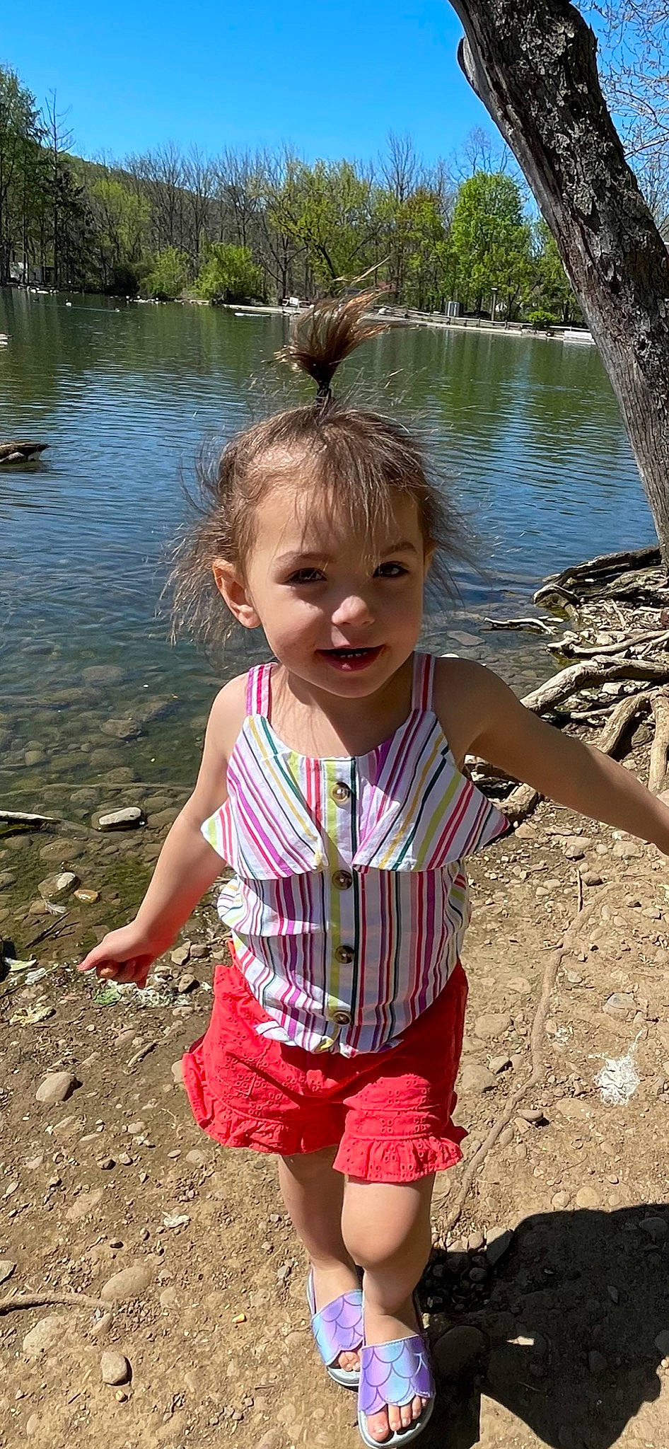 Cianna joined the competition — help win amazing prizes! baby_toddler_clothing, body_of_water, child, eye, facial_expression, fun, grass, hairstyle, happy, lake, leisure, mammal, natural_environment, nature, people_in_nature, person, plant, skin, toddler, tree