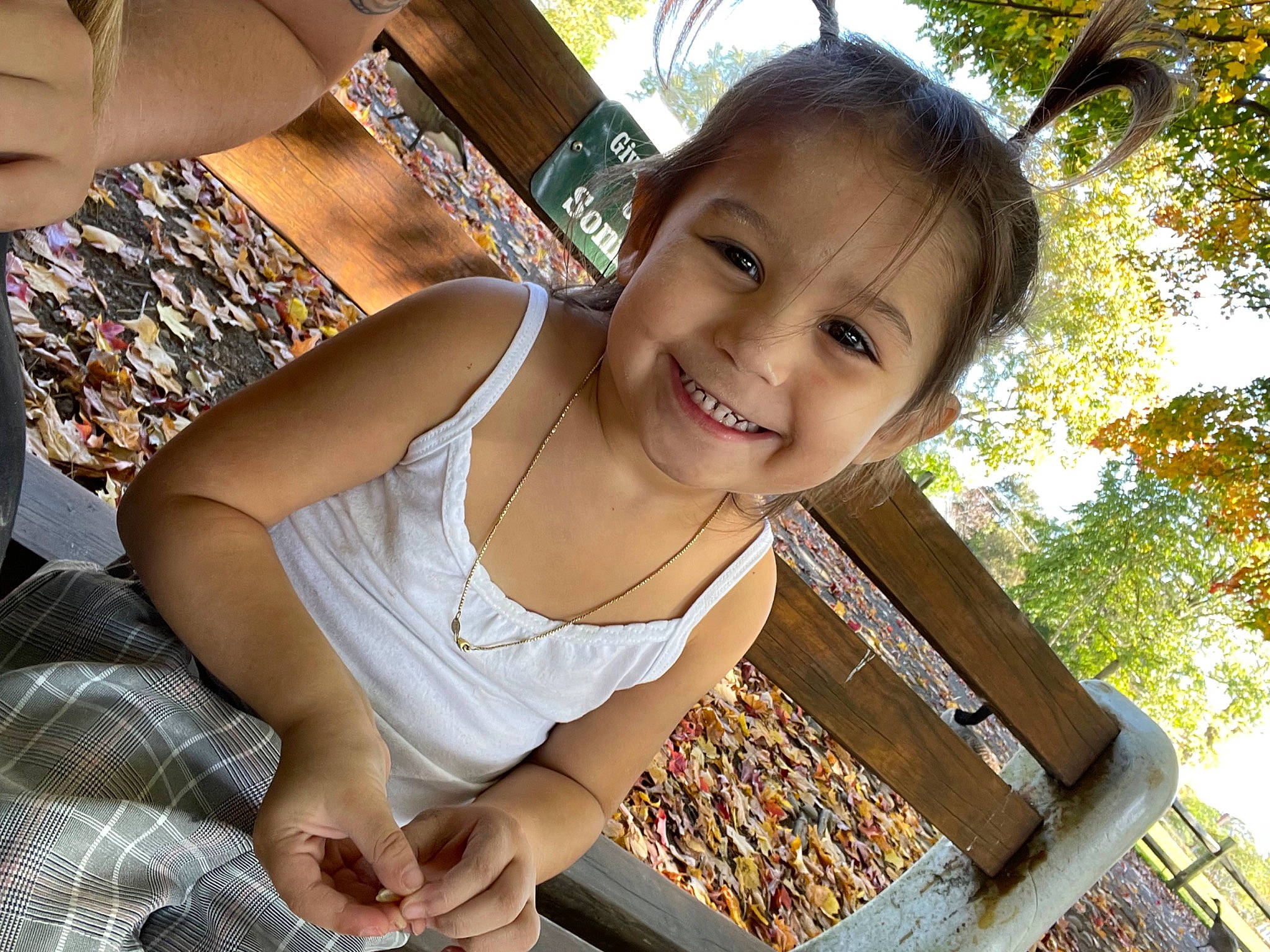 Amiyah joined the competition — help win amazing prizes! black_hair, brown_hair, child, fun, grass, hairstyle, happy, human_leg, joy, leaf, leisure, neck, people_in_nature, person, photograph, sitting, smile, spring, summer, thigh