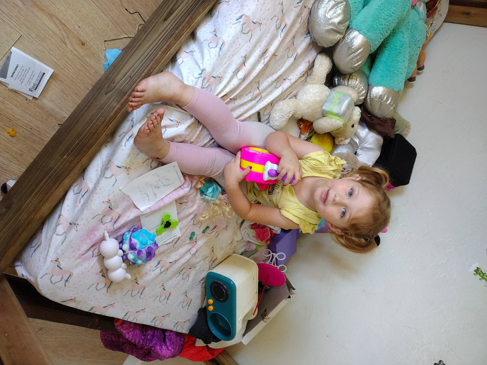 Lillian joined the competition — help win amazing prizes! baby, baby_products, baby_toddler_clothing, baby_toys, child, doll, flooring, fun, hardwood, leisure, pattern, person, plastic, play, room, sitting, toddler, toy, vacation, wood