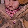 toddler, child, face, expression, robe, brown, plush, cute, indoor, clothing, portrait, funny_face, hair, person, young_child, warm, soft, cozy, playful, closeup