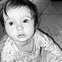 toddler, child, baby, crawling, black_and_white, floor, tile, blanket, toy, curious, expression, face, hair, eyes, clothing, indoors, portrait, young_child, infant, closeup
