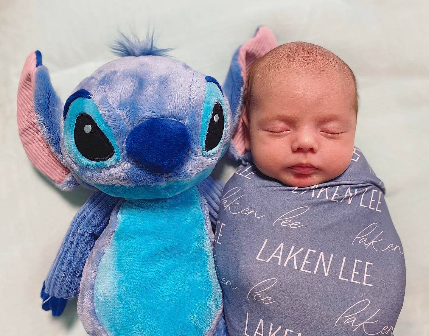 Laken is registered to the contest to win money with this photo: azure, baby, baby_toddler_clothing, child, doll, electric_blue, eyelash, fashion_accessory, fawn, fictional_character, fur, happy, head, person, plush, skin, stuffed_toy, textile, toddler, toy