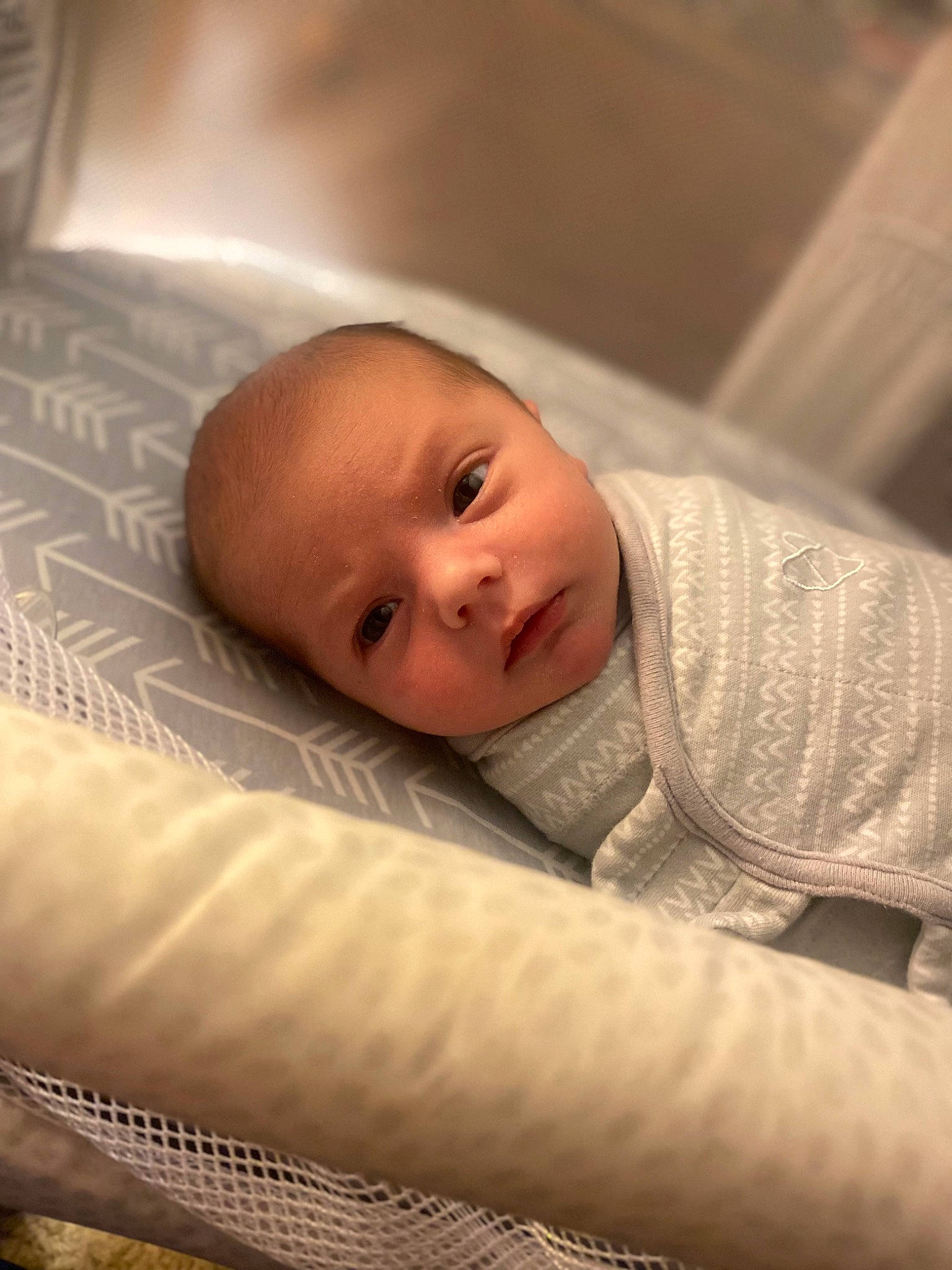 Laken is registered to the contest to win money with this photo: baby, brown, cheek, child, chin, close_up, comfort, eyebrow, flash_photography, flooring, human_body, iris, linens, mouth, nose, person, skin, smile, textile, toddler