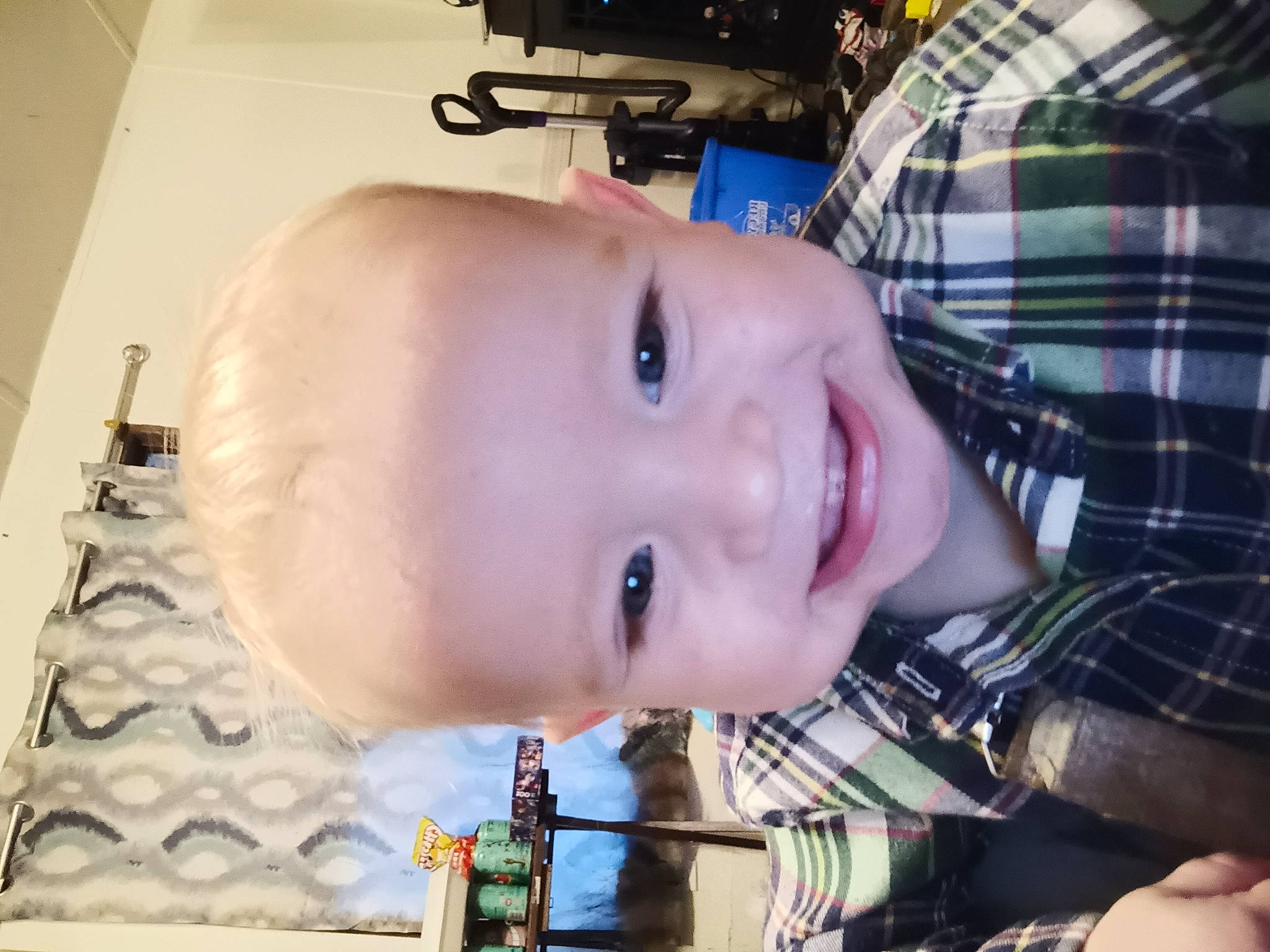 Ethan is registered to the contest to win money with this photo: cheek, child, chin, ear, eye, eyebrow, eyelash, forehead, fun, happy, iris, jaw, joy, lip, mouth, nose, person, plaid, skin, smile