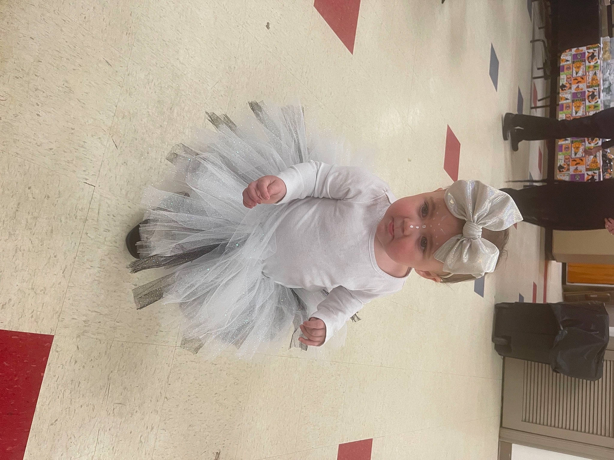 Aaliyah joined the competition — help win amazing prizes! art, baby, ceiling, child, concrete, event, feather, fictional_character, flooring, headwear, linens, paint, painting, paper, person, plaster, room, toddler, visual_arts, wing