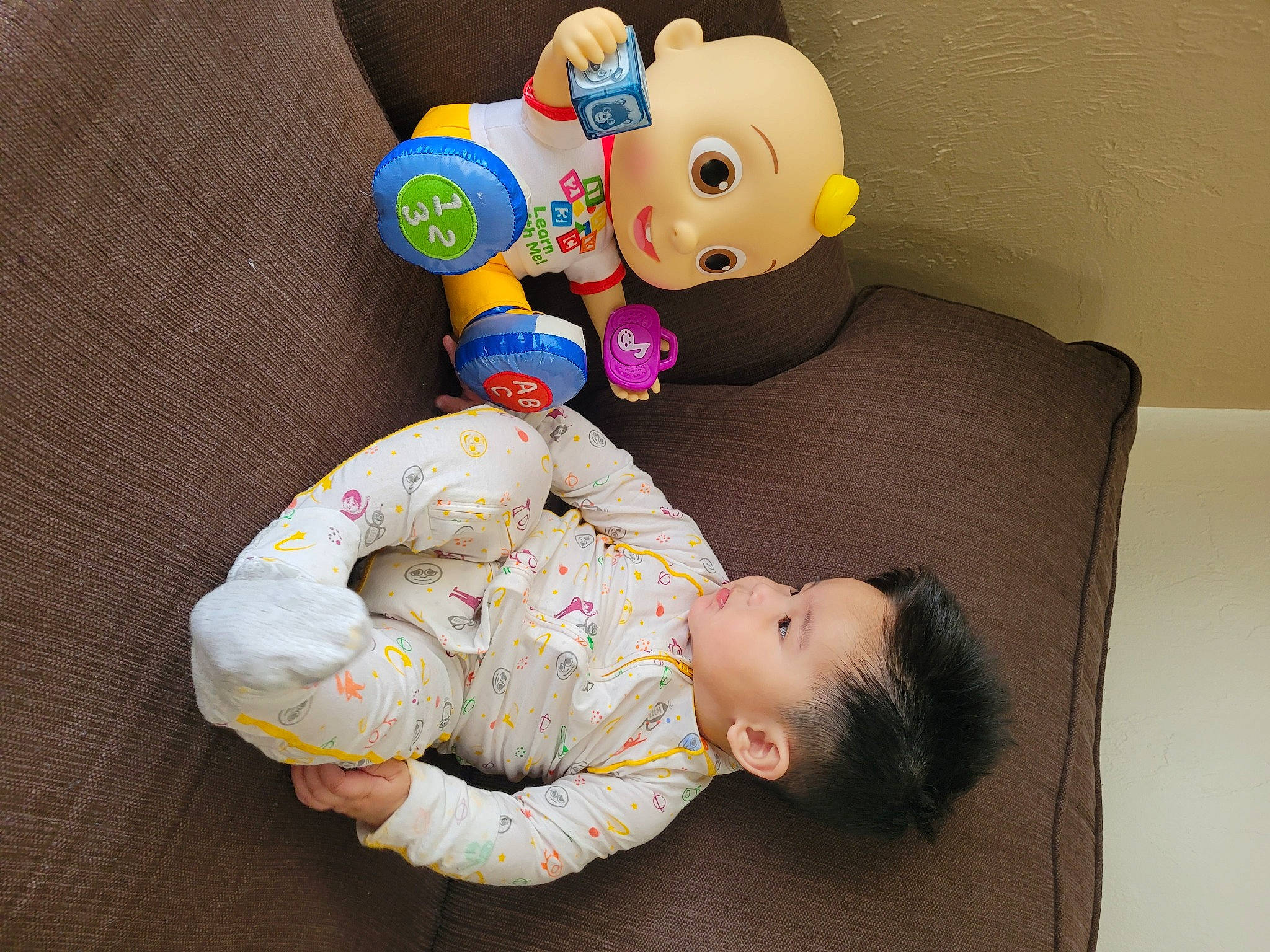 Abram is registered to the contest to win money with this photo: baby, baby_products, baby_sleeping, baby_toddler_clothing, baby_toys, bedtime, child, comfort, couch, fun, happy, lap, person, plush, product, room, sitting, stuffed_toy, textile, toddler