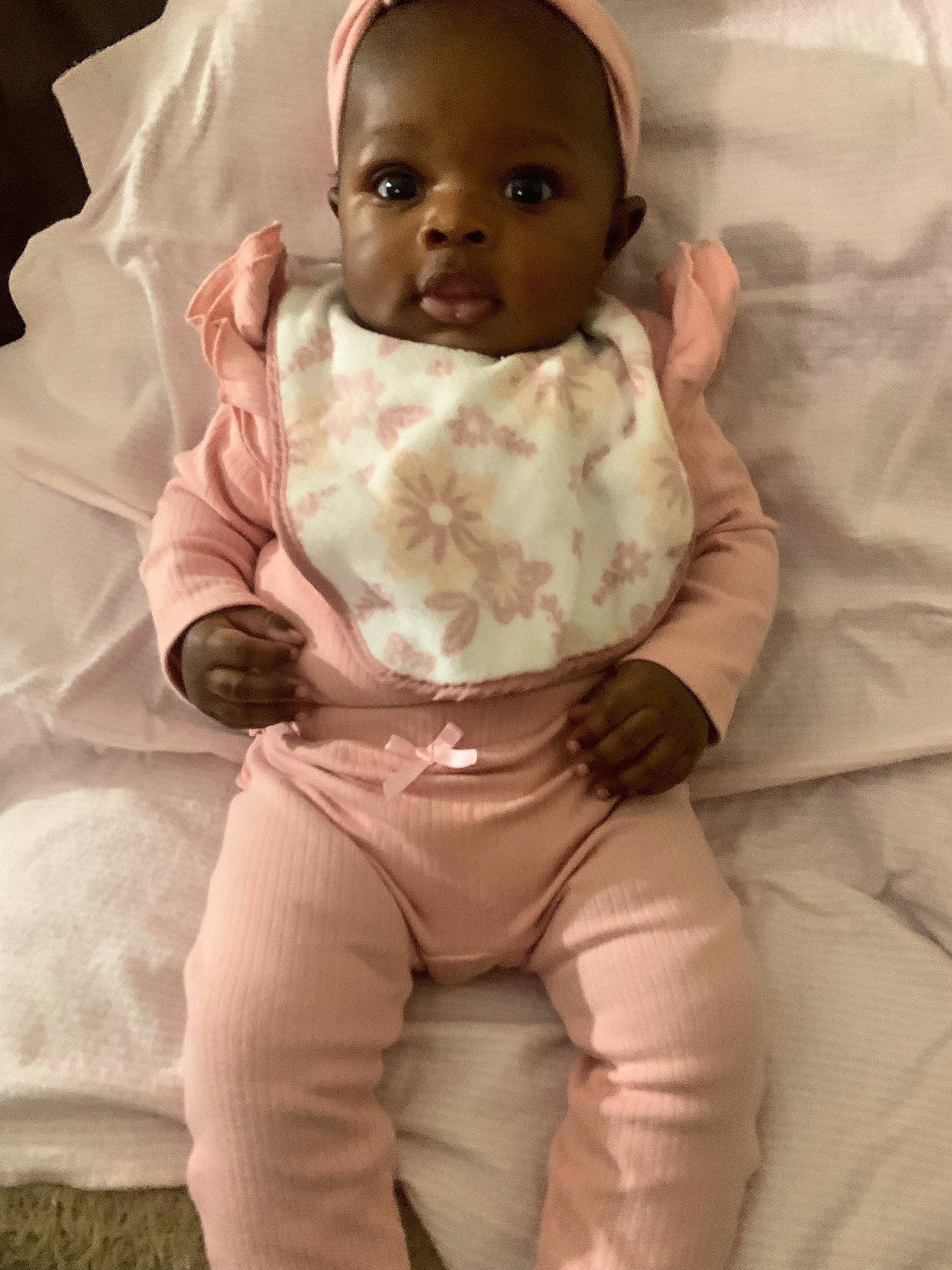 Harmoni is registered to the contest to win money with this photo: abdomen, baby, baby_toddler_clothing, cheek, chest, child, comfort, finger, gesture, happy, head, khaki_pants, linens, person, skin, sleeve, smile, textile, thumb, toddler