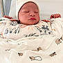 Zélie a rejoint le concours — aidez-le/la à gagner de superbes lots ! newborn, baby, sleeping, blanket, beanie, infant, cute, animal_print, bed, clothing, face, peaceful, wrapped, soft, indoors, child, resting, pale, small_hands, cozy