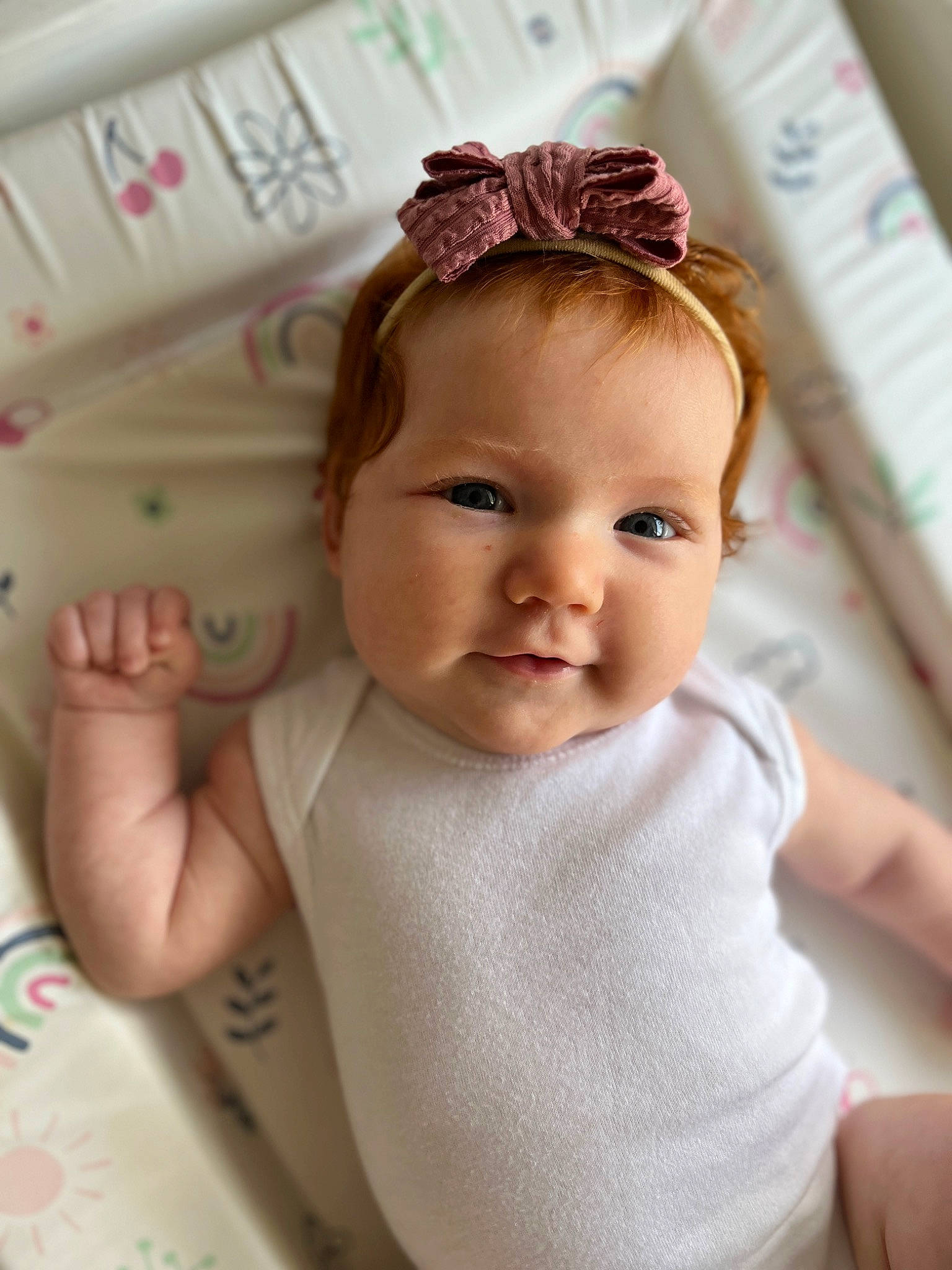 Delilah is registered to the contest to win money with this photo: baby, baby_toddler_clothing, cheek, child, chin, eye, eyebrow, eyelash, facial_expression, happy, headband, headpiece, iris, lip, neck, person, pink, product, skin, sleeve