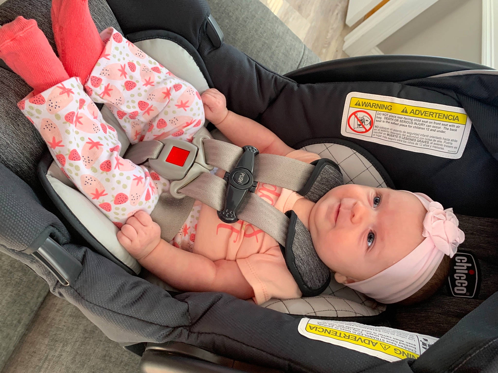 Dani is registered to the contest to win money with this photo: auto_part, automotive_design, baby, baby_carriage, baby_in_car_seat, baby_products, car_seat, car_seat_cover, child, comfort, finger, hand, headwear, human_leg, leg, motor_vehicle, person, seat_belt, sitting, thigh