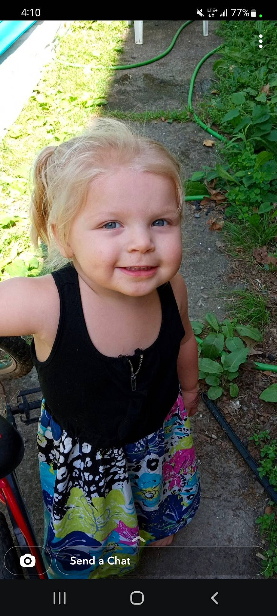 Gracie is registered to the contest to win money with this photo: baby_toddler_clothing, child, eye, face, fun, grass, hair, happy, head, iris, joy, leisure, mammal, people, people_in_nature, person, plant, skin, sleeve, smile