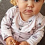 baby, child, pajamas, food, plate, hands, face, eyes, expression, pout, sitting, indoors, cozy, curious, skin, head, young, person, snack, clothing