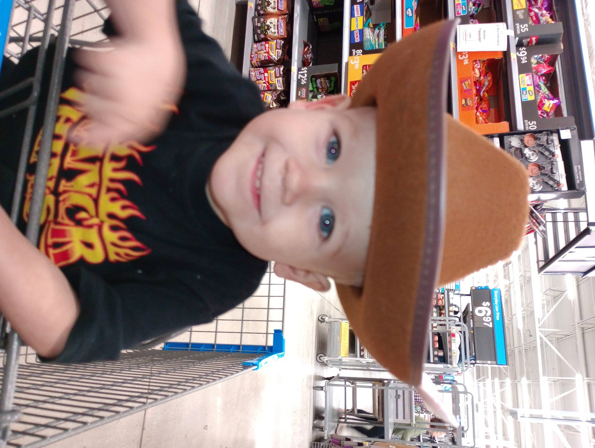 Tony joined the competition — help win amazing prizes! black_hair, bookcase, child, city, fun, happy, hat, headwear, joy, leisure, pattern, person, photography, play, publication, retail, shelf, shelving, smile, snapshot