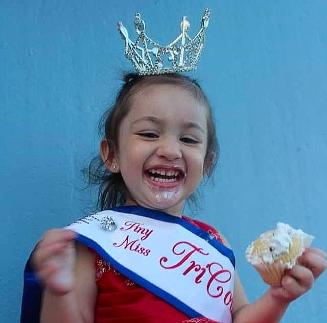 Christiana joined the competition — help win amazing prizes! child, costume_hat, crown, dessert, event, face, fashion_accessory, finger_food, food, food_craving, fun, gesture, happy, headpiece, ice_cream, jewellery, joy, junk_food, person, smile