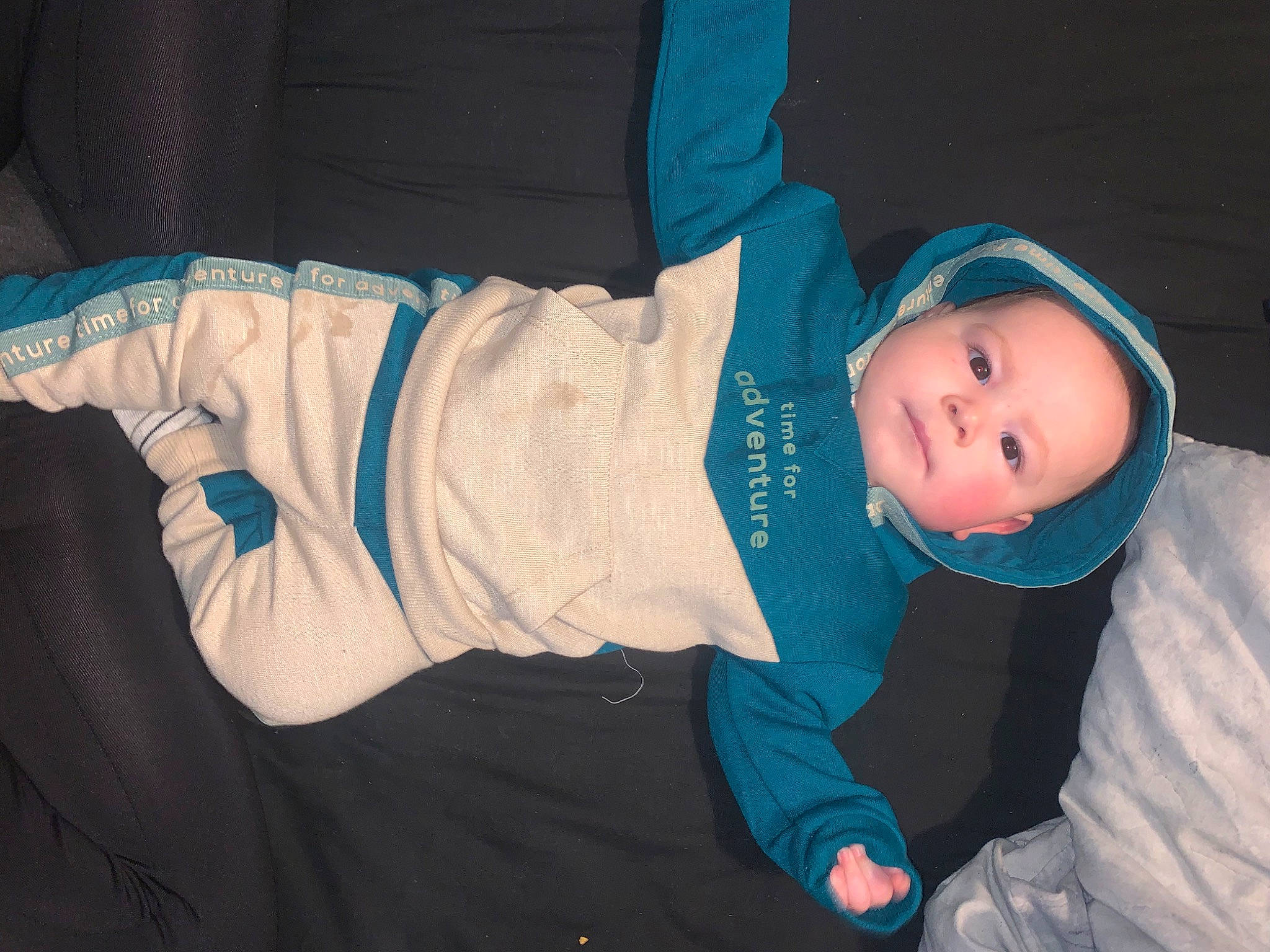 Teddy joined the competition — help win amazing prizes! baby, baby_toddler_clothing, child, comfort, cool, elbow, electric_blue, finger, flash_photography, fun, hat, human_body, mouth, person, room, sitting, sleeve, smile, t_shirt, toddler