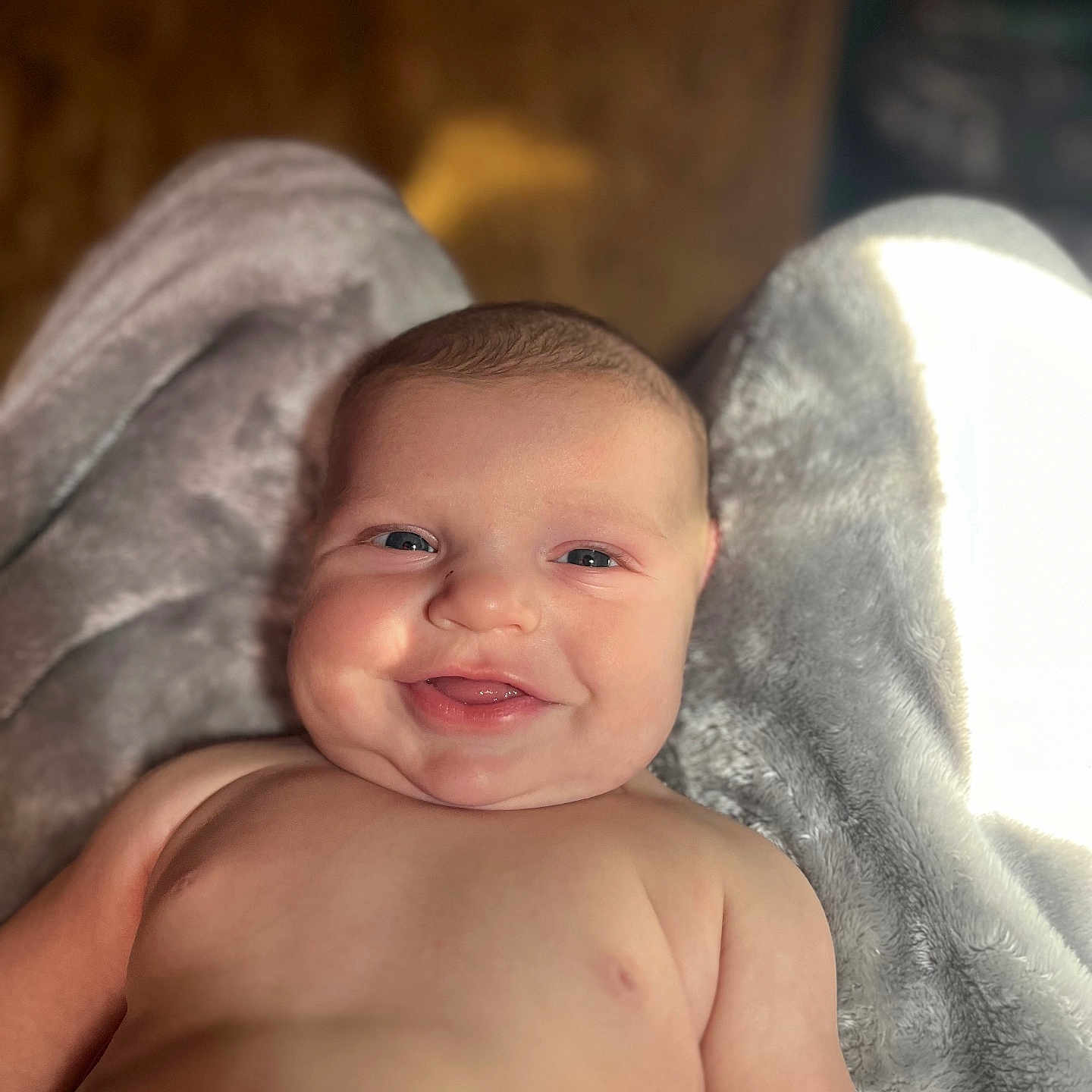 Johnathan is registered to the contest to win money with this photo: baby, babylaughing, blanket, bodypart, cushion, face, finger, hand, happy, head, homedecor, laughing, mouth, newborn, person, photography, portrait, quilt, smile, teeth
