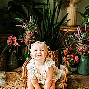 Camryn is registered to the contest to win money with this photo: baby, babylaughing, basket, blonde, clothing, crawling, face, flower, flowerarrangement, hair, happy, head, person, photography, plant, portrait, pottedplant, sitting, sleeve, smile