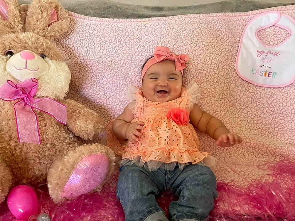 Serenity joined the competition — help win amazing prizes! baby, baby_sleeping, baby_toddler_clothing, child, comfort, happy, hat, headgear, headwear, linens, magenta, person, pink, room, skin, smile, stuffed_toy, teddy_bear, textile, toddler