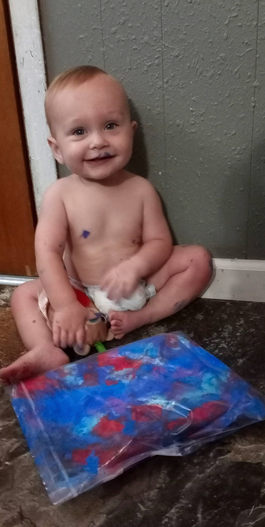 Ember Rain is registered to the contest to win money with this photo: art, baby, bathing, cheek, chest, child, face, finger, fun, happy, joy, mouth, muscle, paint, person, play, sitting, skin, smile, stomach