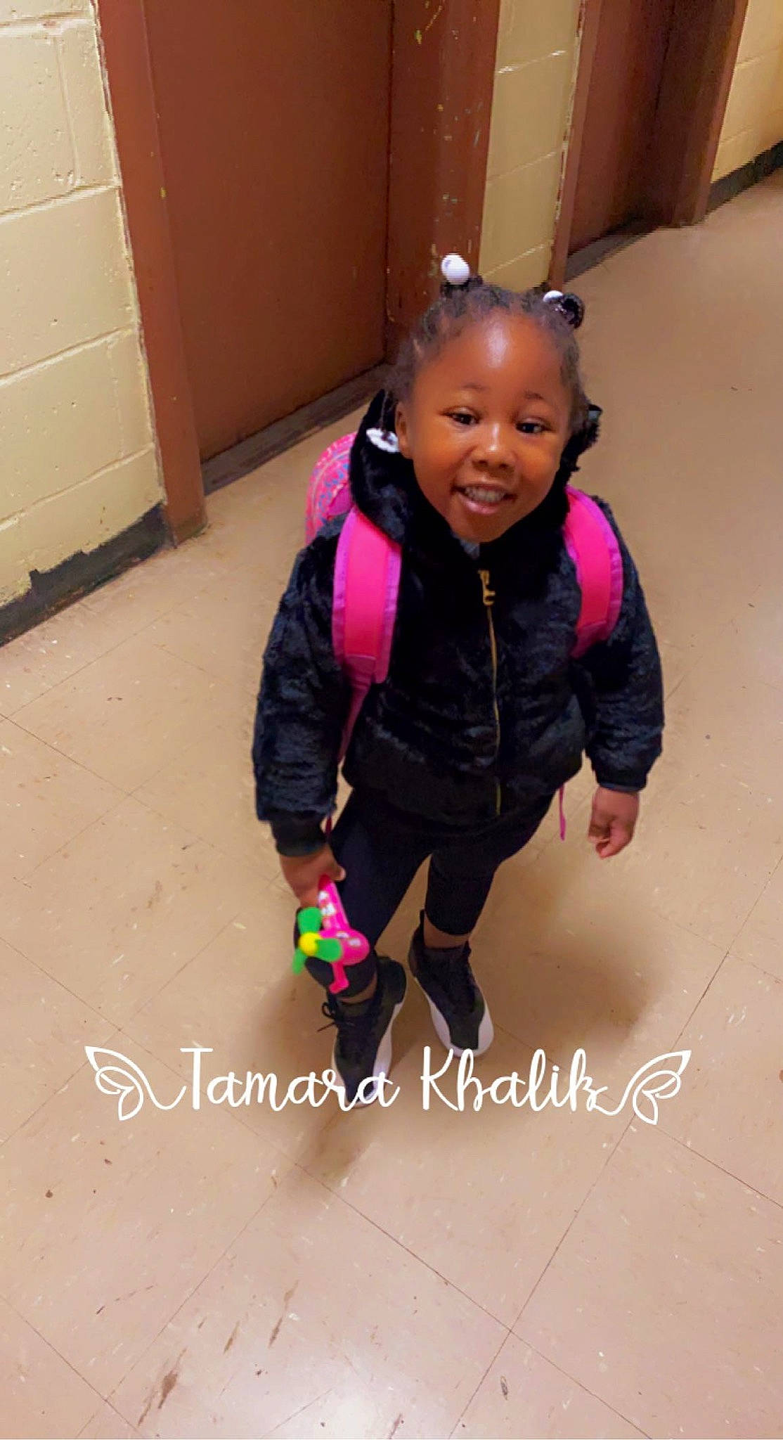 Krystal joined the competition — help win amazing prizes! arm, baby_toddler_clothing, child, clothing, door, face, fashion_accessory, flooring, fun, happy, jewellery, joy, magenta, person, personal_protective_equipment, pink, room, skin, sleeve, smile