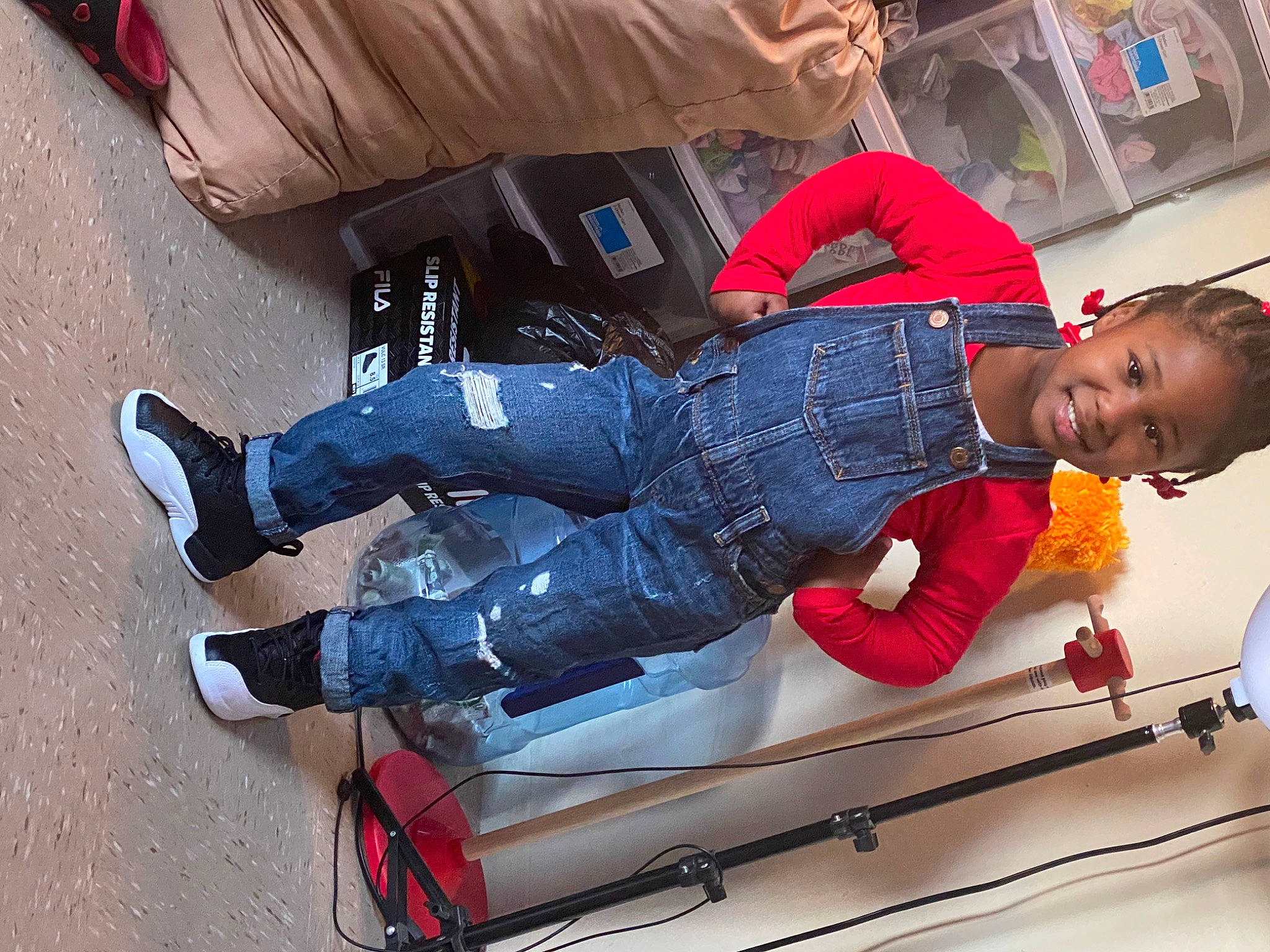 Krystal joined the competition — help win amazing prizes! automotive_design, blurred, carmine, comfort, couch, denim, electric_blue, flooring, fun, human_leg, joint, joy, knee, leg, leisure, machine, person, sitting, smile, sneakers