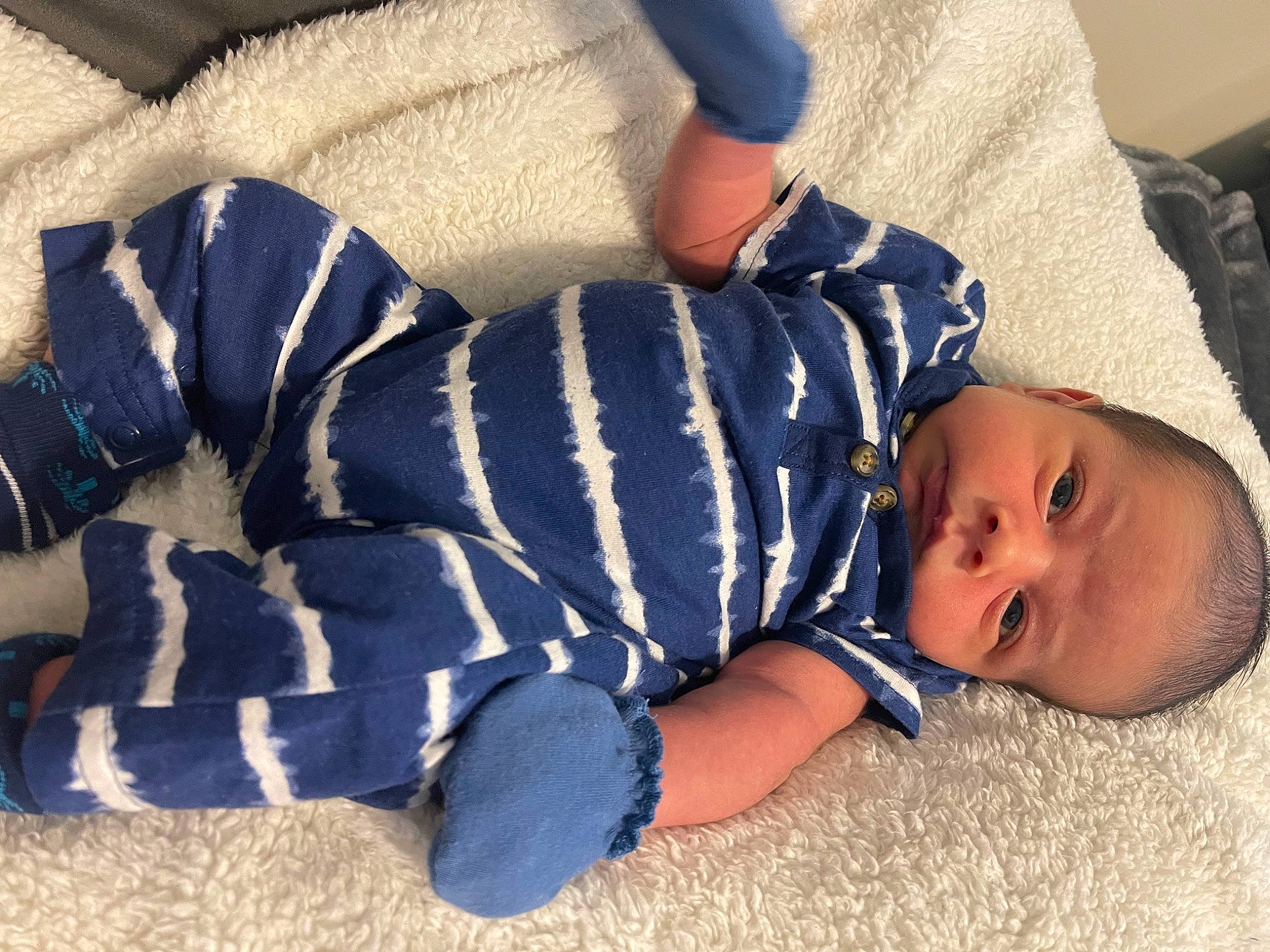 Lucas is registered to the contest to win money with this photo: arm, baby, baby_products, baby_sleeping, baby_toddler_clothing, bedtime, child, comfort, couch, electric_blue, eye, linens, mammal, nap, pattern, person, room, sitting, sleeve, textile