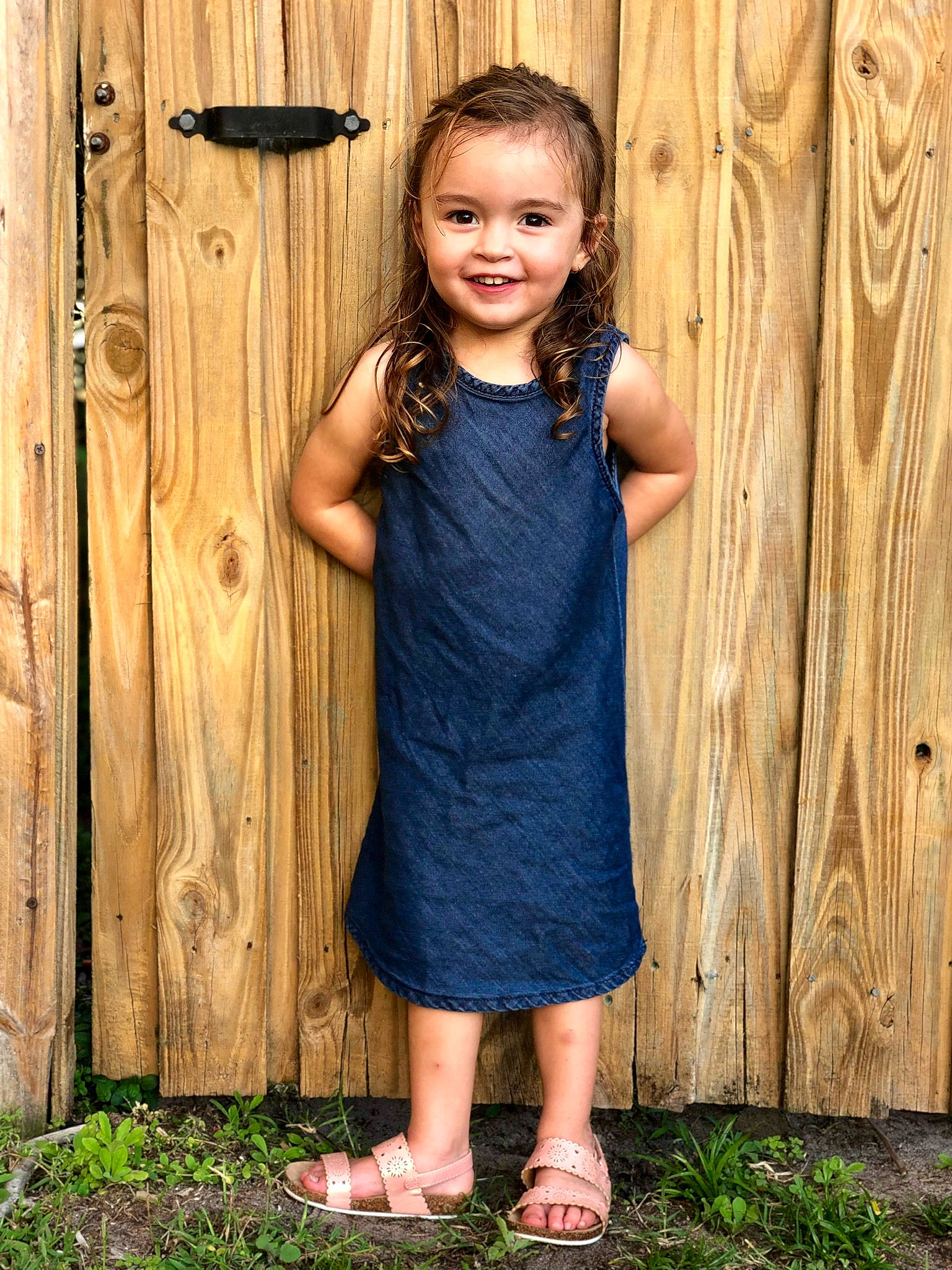 Victoria is registered to the contest to win money with this photo: child, child_model, clothing, dress, grass, joy, pattern, person, sleeve, smile, standing, toddler