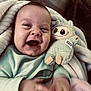 Kassim a rejoint le concours — aidez-le/la à gagner de superbes lots ! baby, blanket, child, clothing, comfort, cozy, cute, expression, face, hand, happy, indoor, infant, laughing, person, plush_toy, portrait, smile, toy, warm