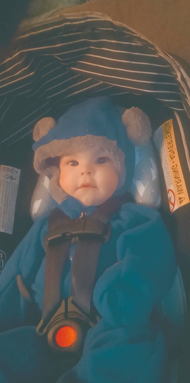 Evander joined the competition — help win amazing prizes! baby, baby_carriage, baby_products, baby_toddler_clothing, cap, cheek, child, darkness, electric_blue, fun, hat, headwear, iris, mouth, nose, person, plastic, sitting, space, toddler