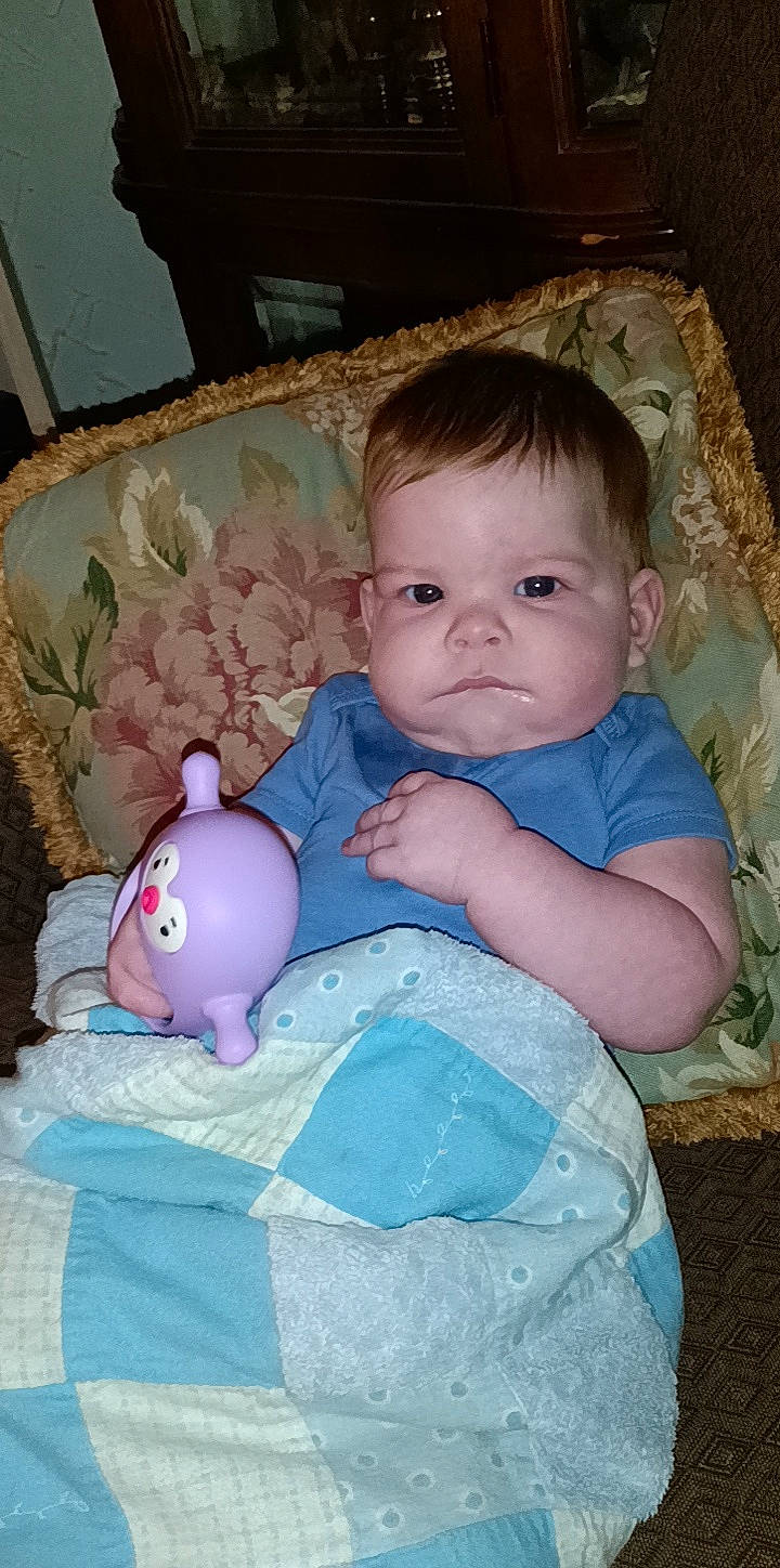 Evander joined the competition — help win amazing prizes! baby, baby_products, baby_toddler_clothing, cheek, child, comfort, eye, facial_expression, fun, happy, iris, linens, person, pink, plush, product, sitting, skin, textile, toddler