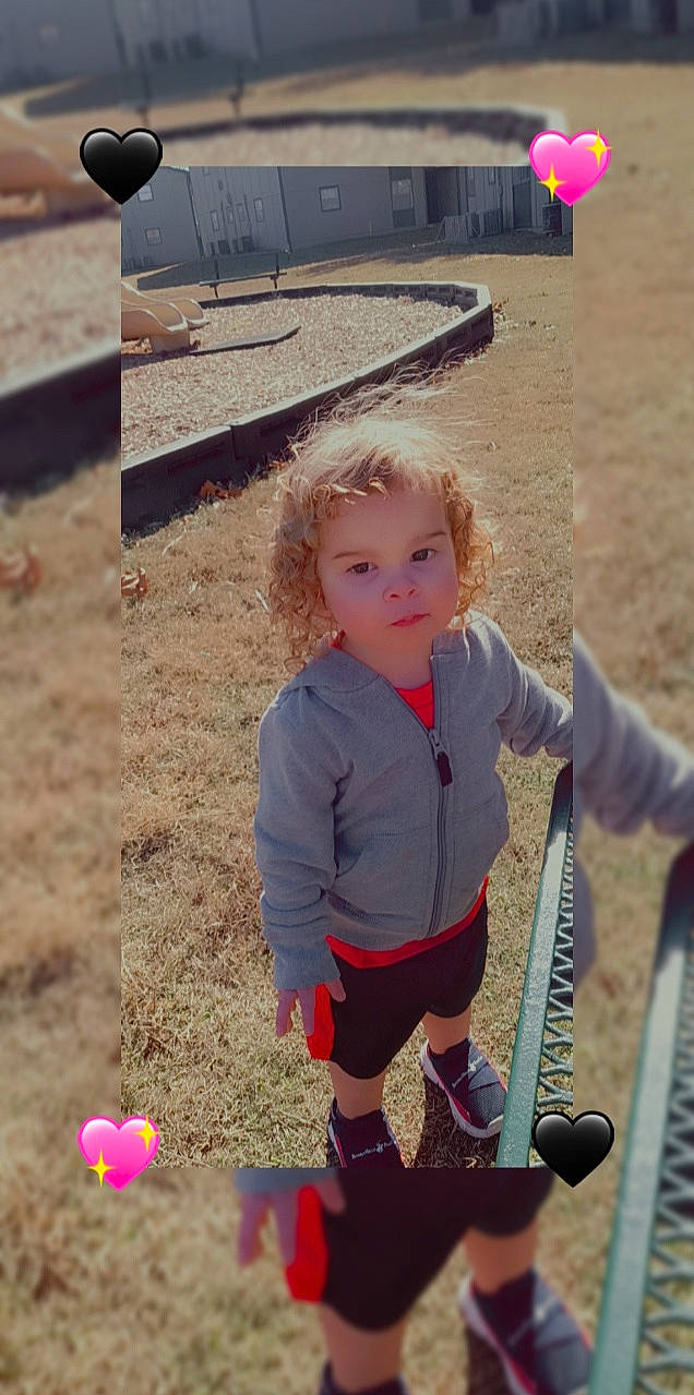 Conner joined the competition — help win amazing prizes! asphalt, child, city, electric_blue, fun, grass, human_leg, leisure, outdoor_play_equipment, people_in_nature, person, play, public_space, recreation, sand, sitting, soil, summer, toddler, tree