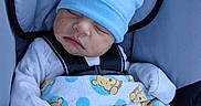 Alex joined the competition — help win amazing prizes! baby, sleeping, car_seat, blue_hat, blanket, teddy_bear_pattern, white_mittens, child, infant, cozy, resting, cute, peaceful, portrait, indoors, fabric, soft, comfort, strap, seat