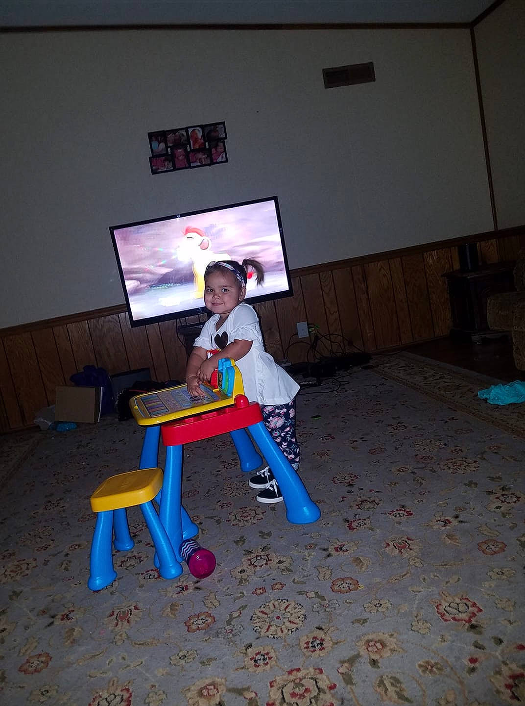Raylynn is registered to the contest to win money with this photo: child, easel, fun, joy, person, play