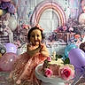 Devani joined the competition — help win amazing prizes! toddler, cake, birthday, balloons, pink_dress, flower, roses, candle, smiling, celebration, background, rainbow, party, clapping, happy, child, decorations, table, indoors, cute