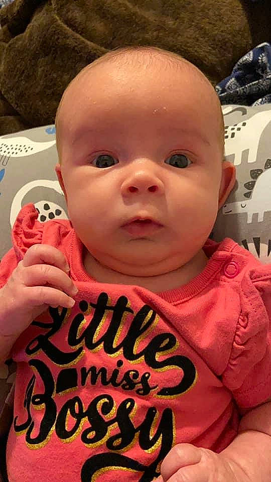 Lana is registered to the contest to win money with this photo: baby, cheek, child, chin, cool, eyebrow, eyelash, facial_expression, forehead, gesture, hairstyle, happy, human, lip, mammal, mouth, nose, person, pink, product