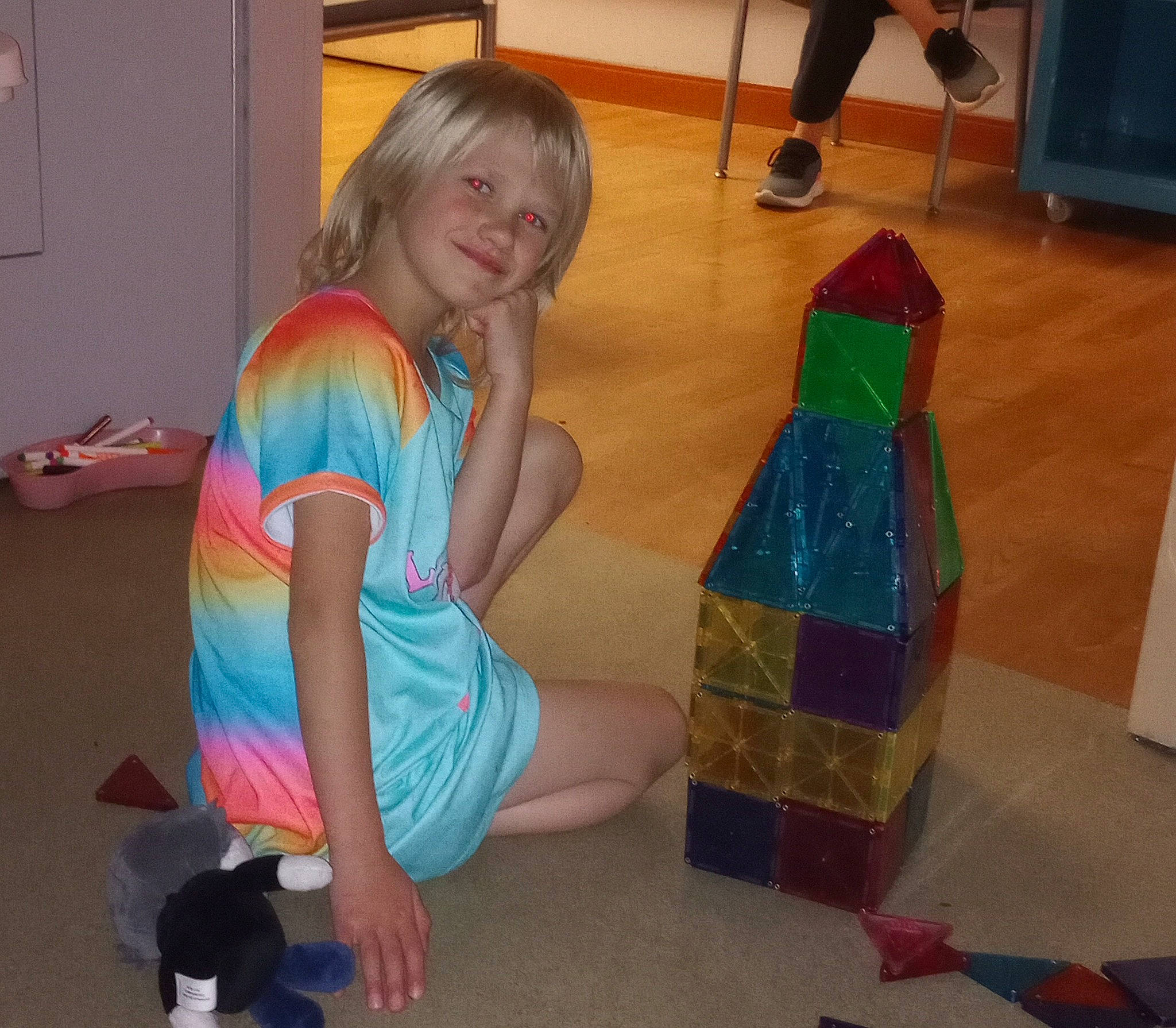 Kendra is registered to the contest to win money with this photo: child, door, event, floor, flooring, fun, hardwood, human_leg, joint, joy, leisure, mammal, person, play, room, sitting, smile, standing, thigh, varnish