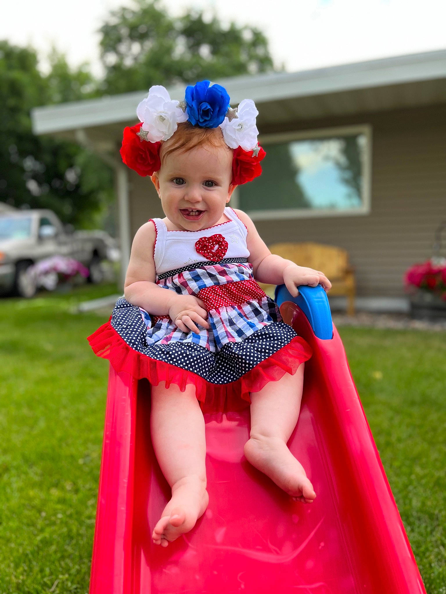 Annelise joined the competition — help win amazing prizes! baby, baby_toddler_clothing, child, electric_blue, event, fun, grass, happy, hat, joy, leisure, magenta, person, pink, plant, recreation, sitting, sky, smile, sun_hat