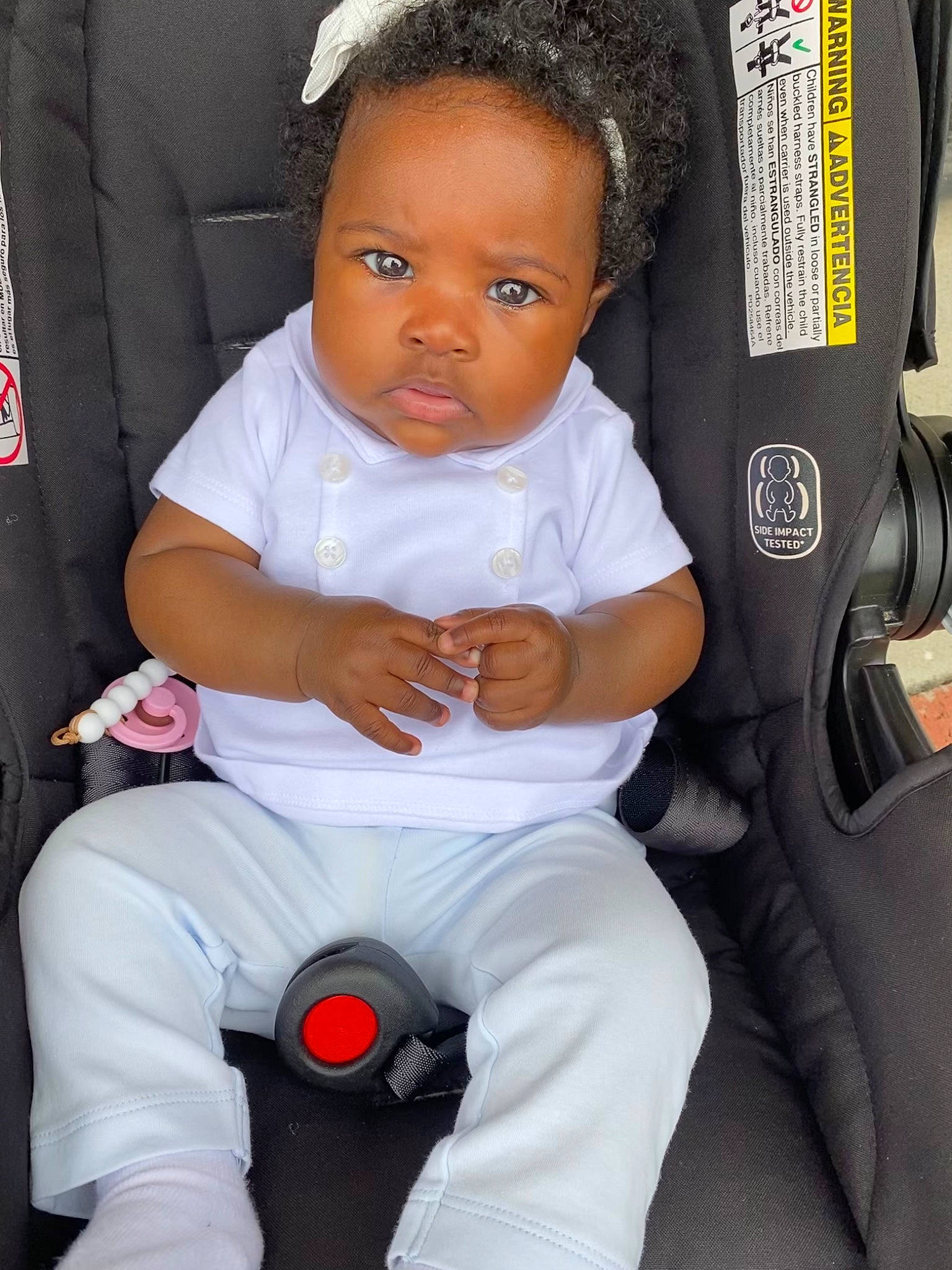 Treasure is registered to the contest to win money with this photo: auto_part, baby, baby_carriage, baby_products, baby_toddler_clothing, black, car_seat, car_seat_cover, child, comfort, fashion_accessory, human_leg, knee, person, product, sitting, sock, steering_wheel, thigh, toddler