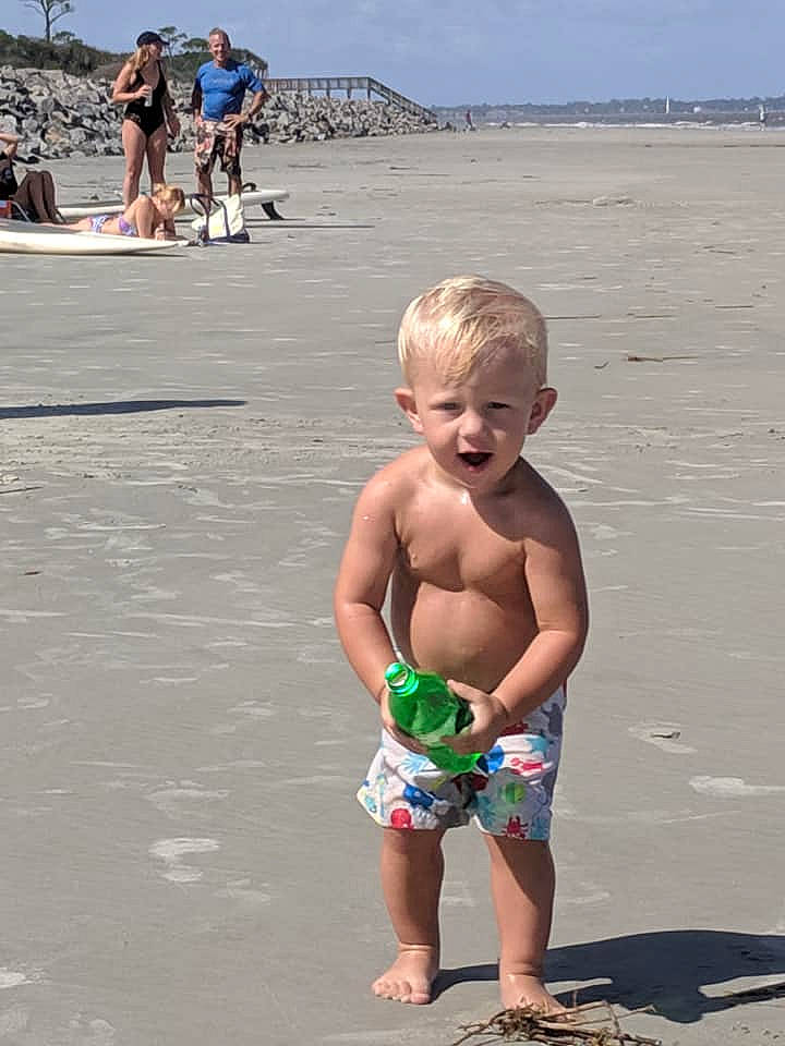 Lan joined the competition — help win amazing prizes! barechested, beach, child, coast, fun, holiday, ocean, person, play, sand, sea, shorts, smile, summer, toddler, tourism, trunks, vacation