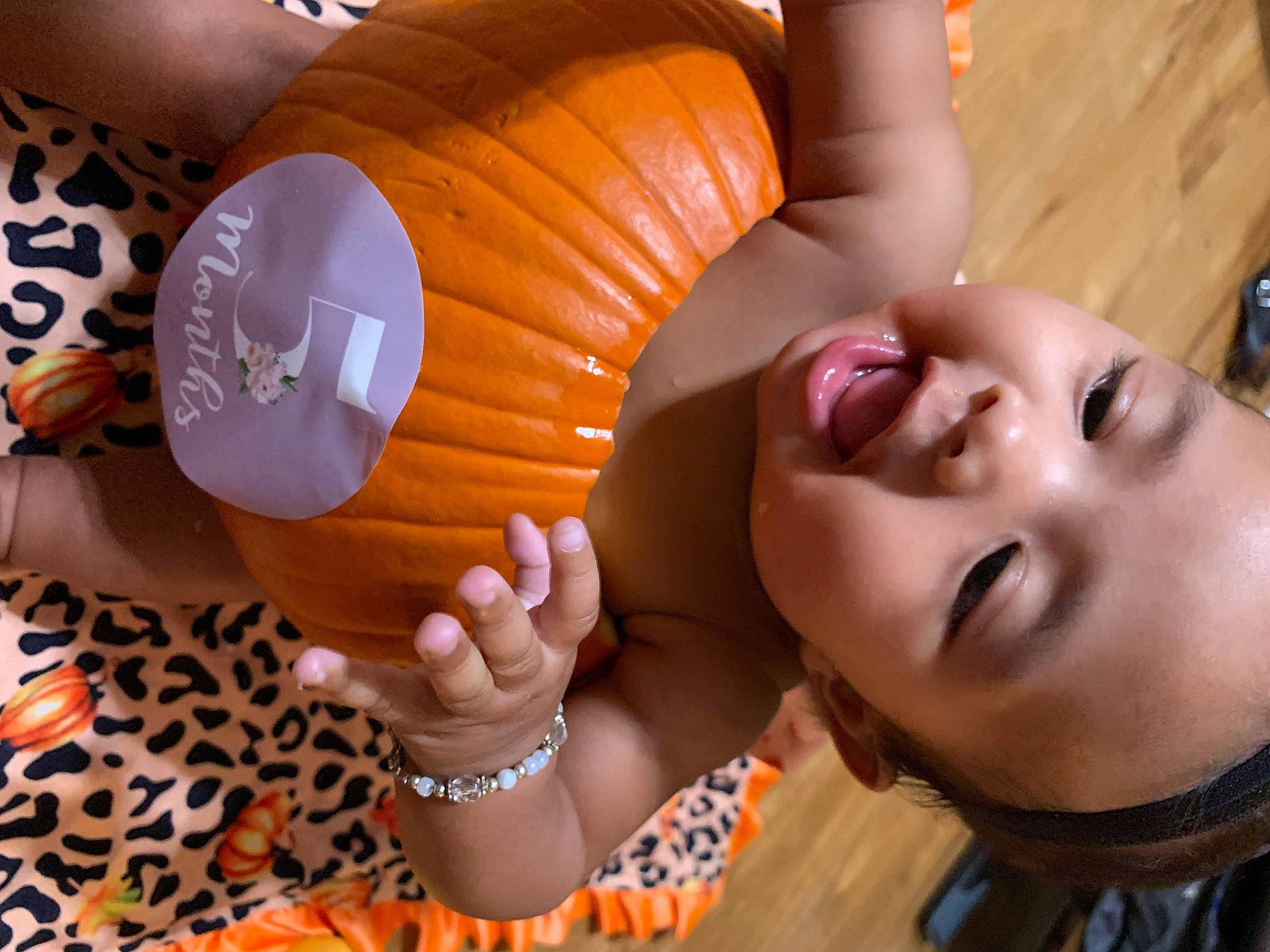 Kiara Kalani is registered to the contest to win money with this photo: abdomen, black_hair, chest, finger, fun, gesture, glasses, hand, happy, leisure, nail, neck, orange, person, plant, sunglasses, thigh, thumb, tree, trunk