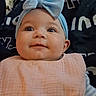 Aspyn joined the competition — help win amazing prizes! baby, blanket, bow, carpet, child, closeup, comfortable, cute, face, happy, headband, home, indoor, infant, person, pink_bib, portrait, smiling, soft_lighting, striped_clothing