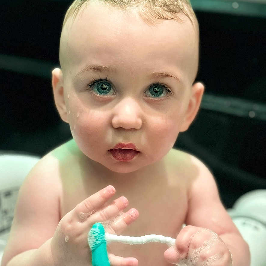 Bentley is registered to the contest to win money with this photo: accessories, architecture, baby, bodypart, brush, building, device, face, finger, hand, head, hospital, mouth, newborn, person, photography, portrait, teeth, tool, toothbrush
