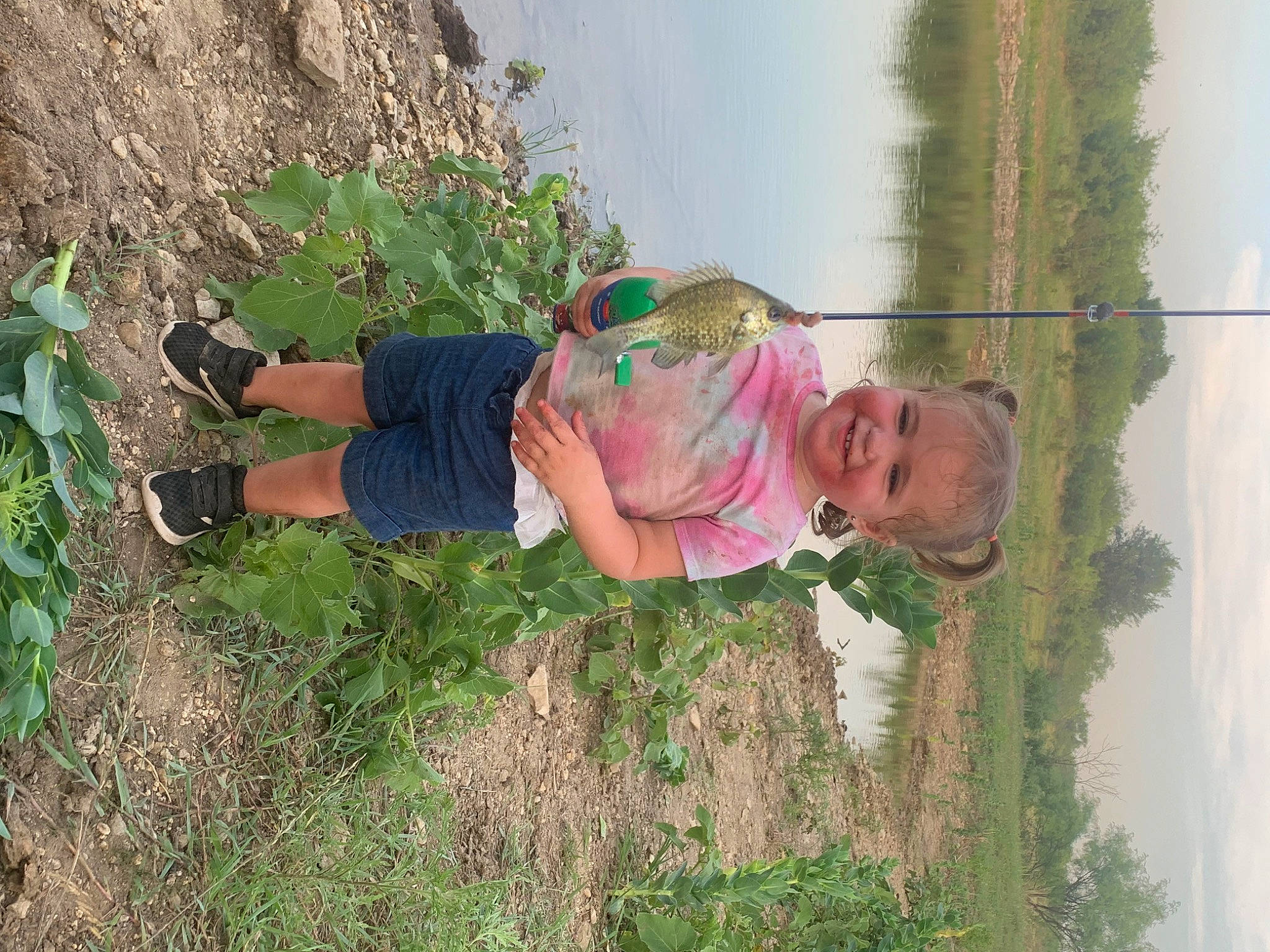 Bexley is registered to the contest to win money with this photo: adaptation, ecoregion, fun, grass, grass_family, grassland, happy, hat, joy, landscape, leisure, people_in_nature, person, plant, shorts, sky, smile, t_shirt, toddler, tree