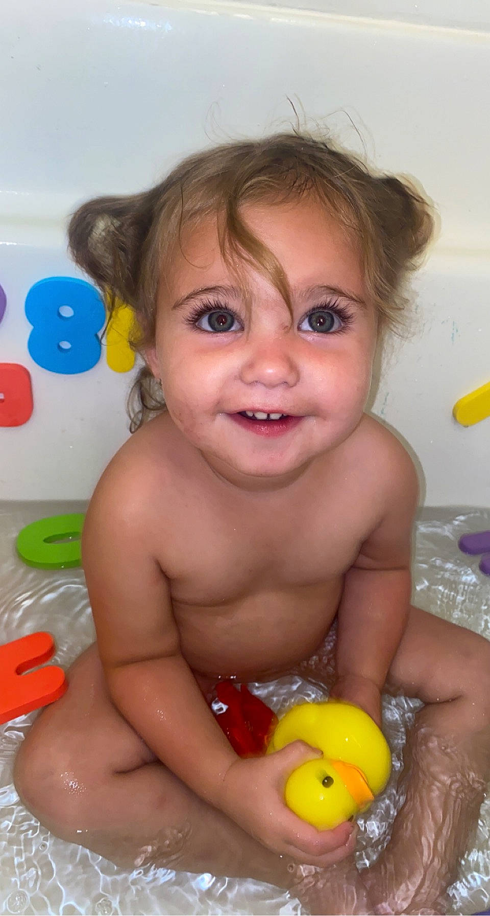 Bexley is registered to the contest to win money with this photo: baby_bathing, baby_playing_with_toys, bath_toy, bathing, cheek, chest, facial_expression, finger, fun, happy, human_body, iris, joy, lip, mouth, nose, organ, person, skin, smile