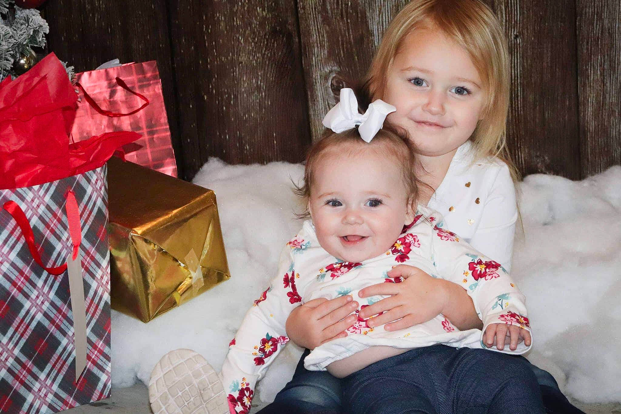 Chevelle joined the competition — help win amazing prizes! baby, child, christmas_eve, daughter, ear, iris, joy, mother, people, person, sibling, sitting, toddler