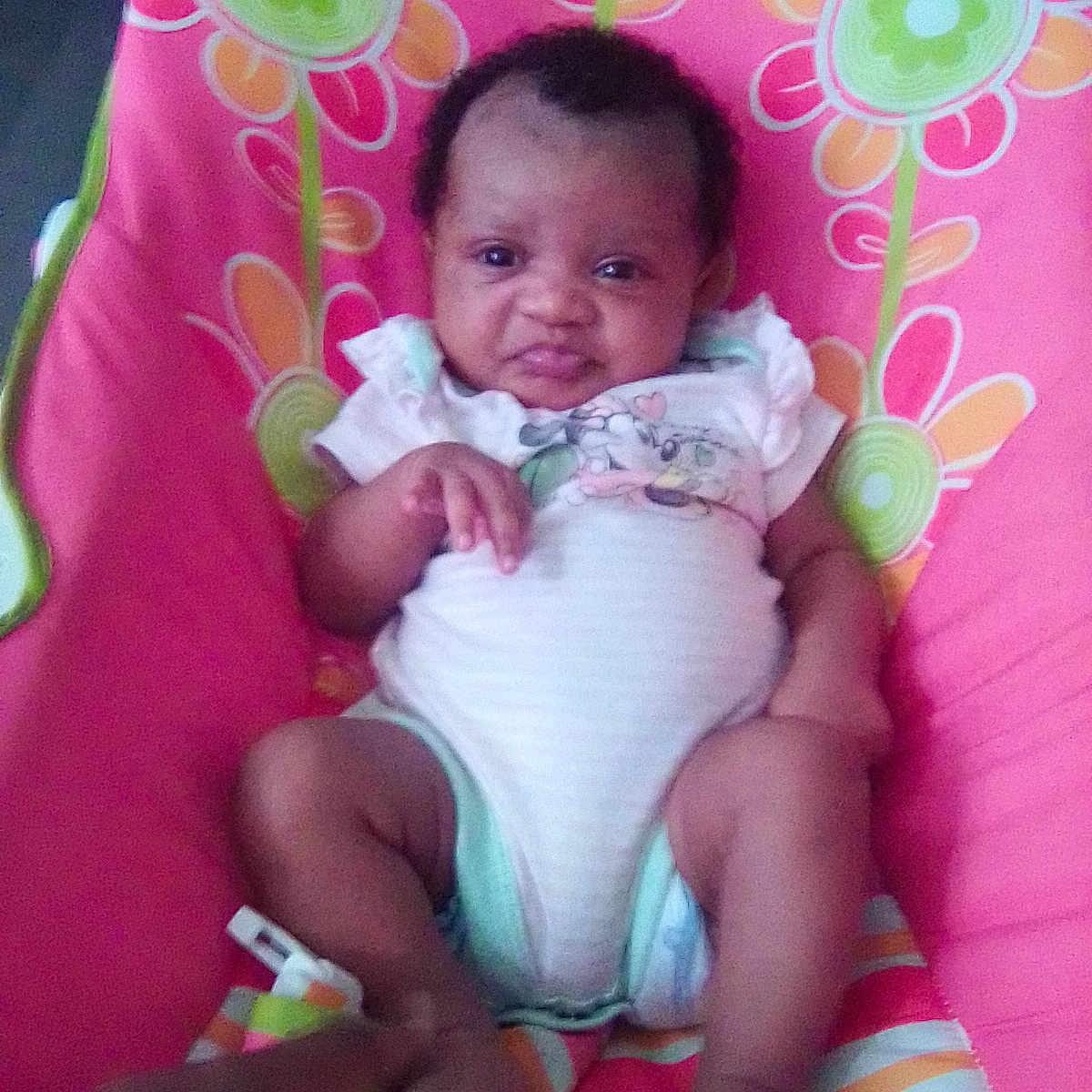 Isabella Liles joined the competition — help win amazing prizes! baby, baby_seat, child, clothing, comfort, cute, diaper, expression, floral_pattern, foot, hand, indoor, infant, person, pink, playful, portrait, relaxing, skin, striped_fabric