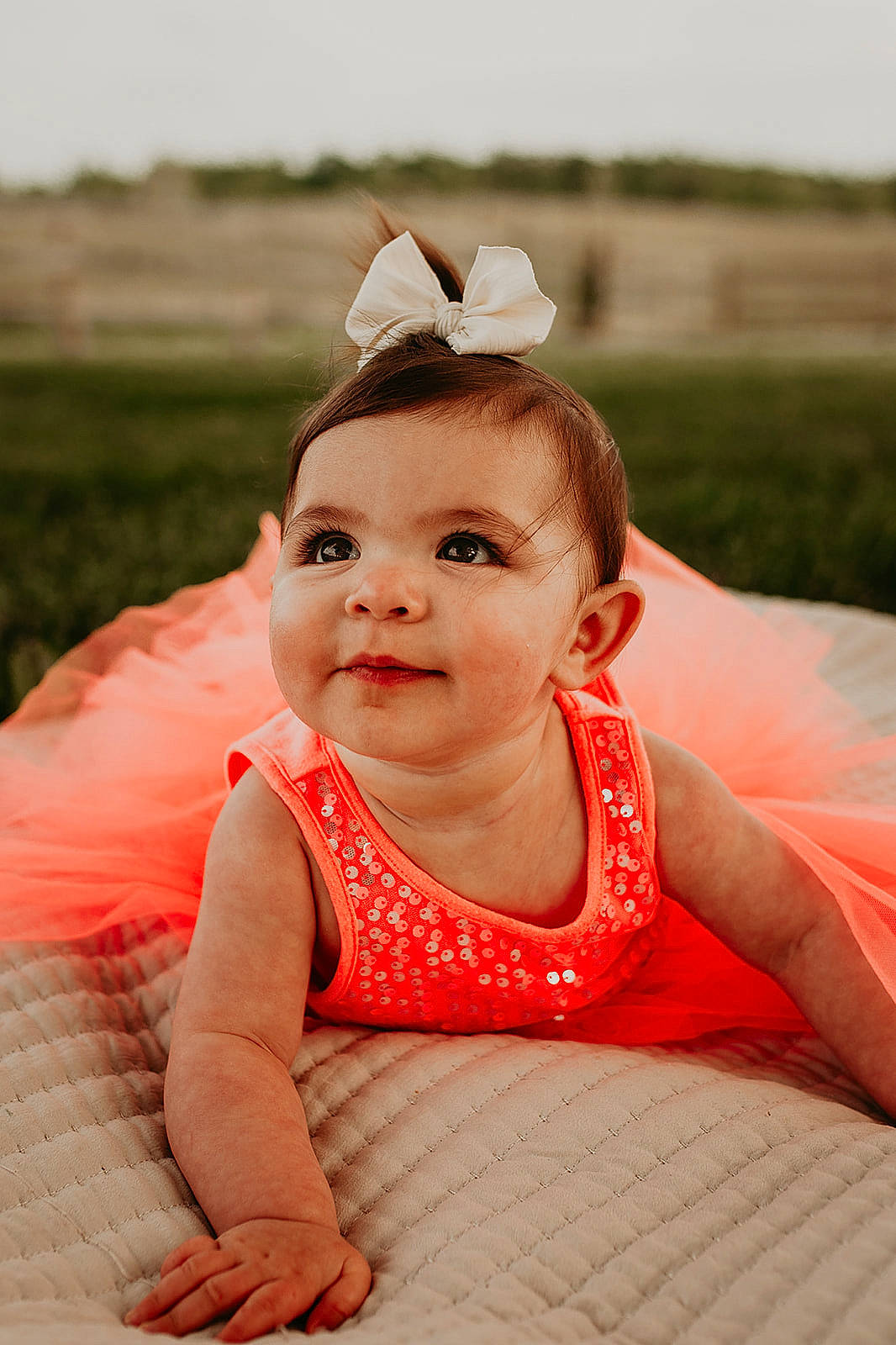 Gabriella joined the competition — help win amazing prizes! baby, baby_toddler_clothing, cheek, child, comfort, dress, fashion_accessory, finger, flash_photography, fun, grass, happy, headpiece, lip, person, pink, recreation, sitting, skin, smile